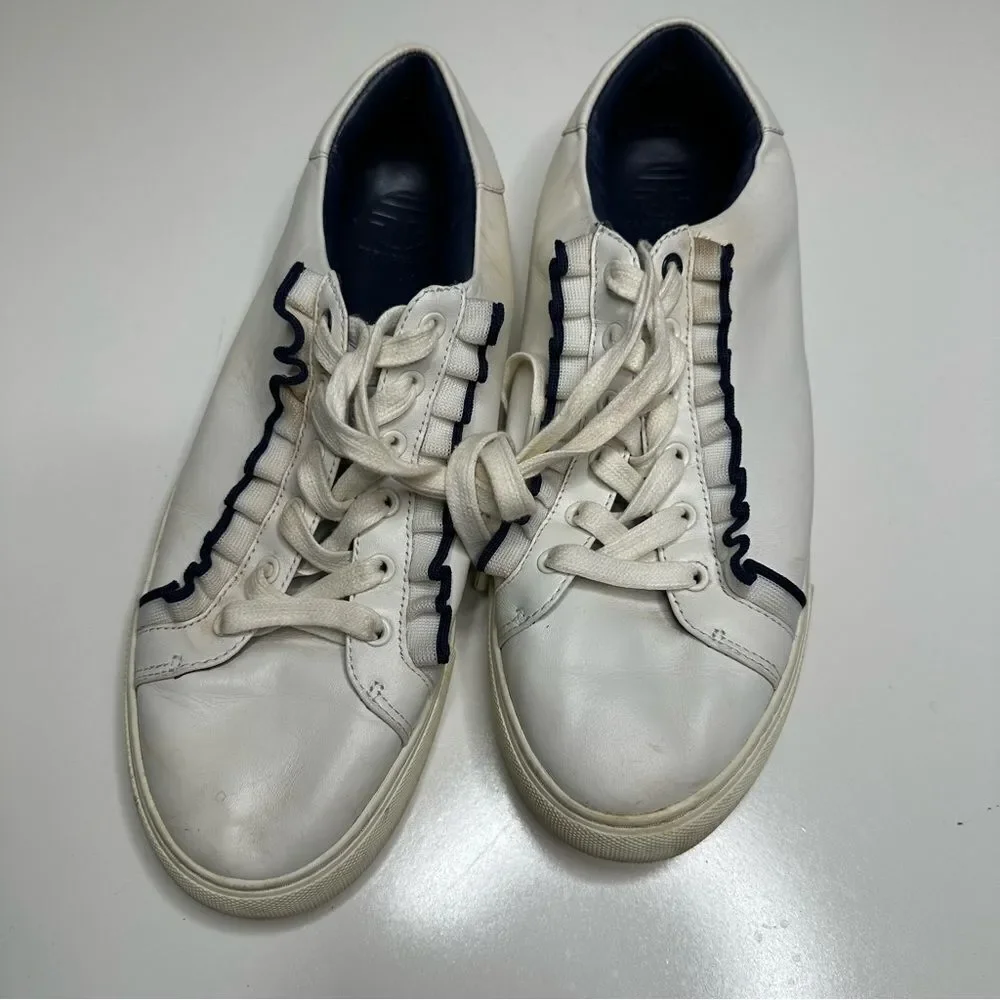 Tory Burch Ruffle sneakers. Size 10M. White with elegant‎ black ruffle.